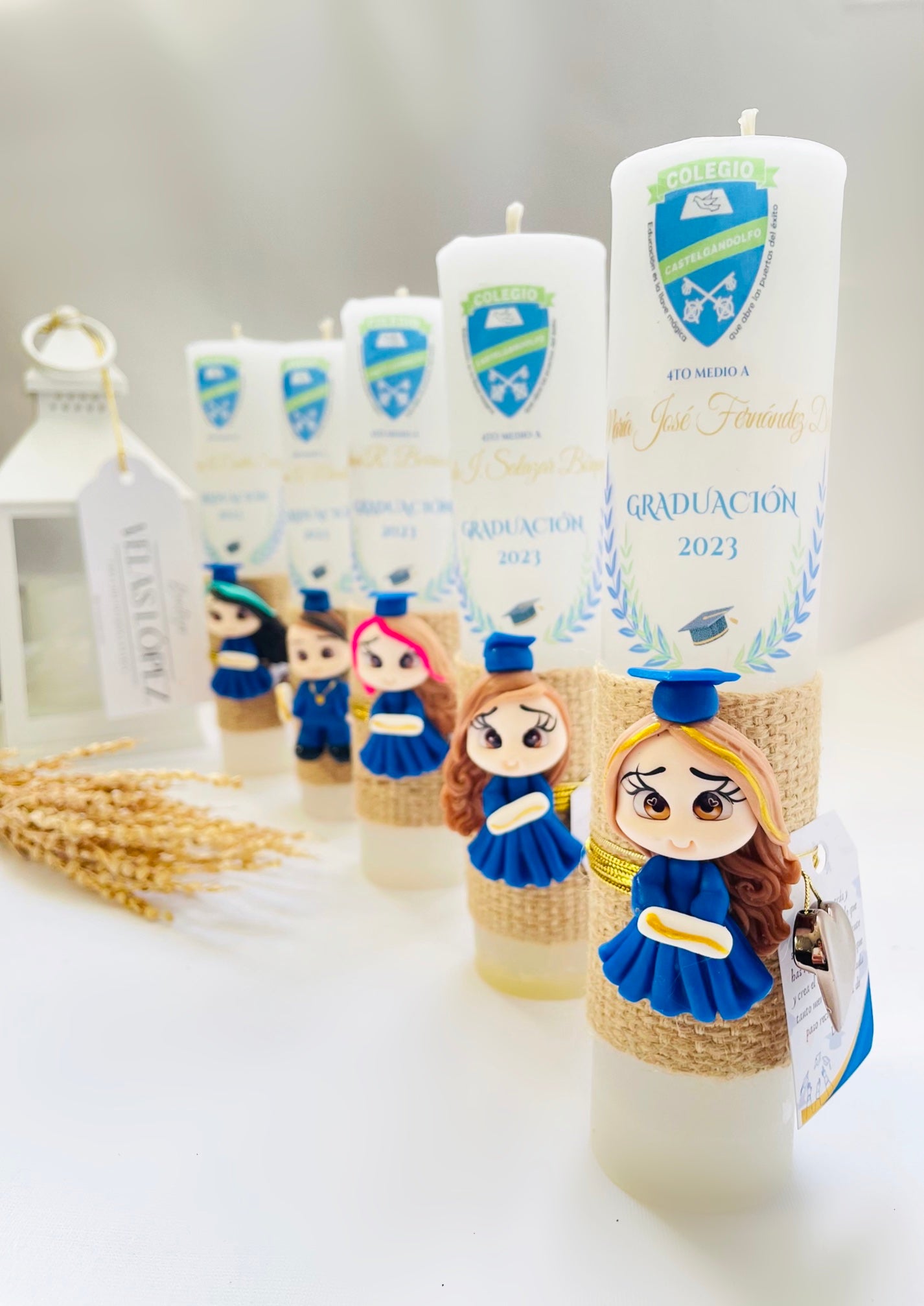 Velas de graduacion con figura de porcelana