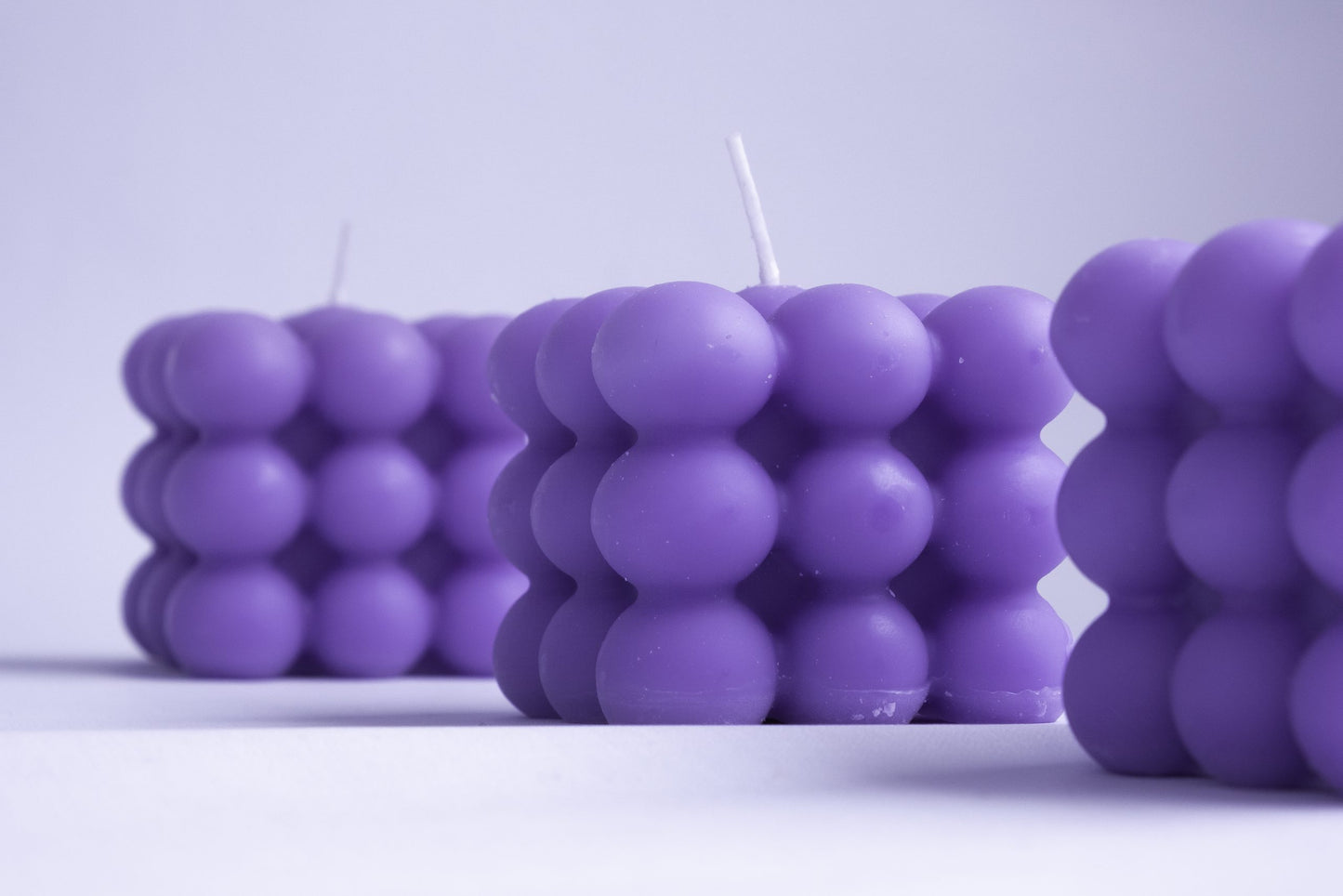 Vela Burbujas Morada