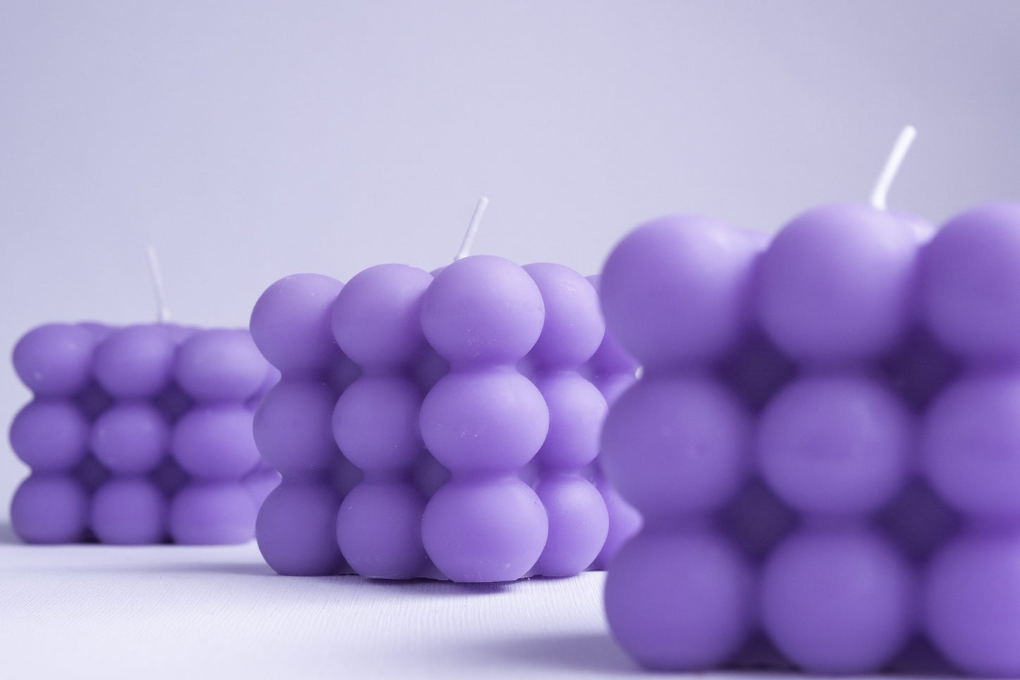 Vela Burbujas Morada